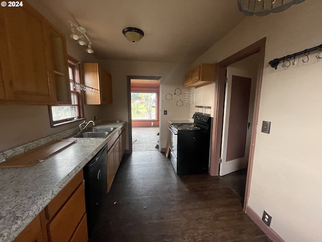 kitchen with sink and black appliances