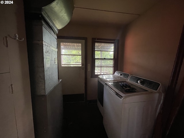 laundry area featuring washing machine and clothes dryer