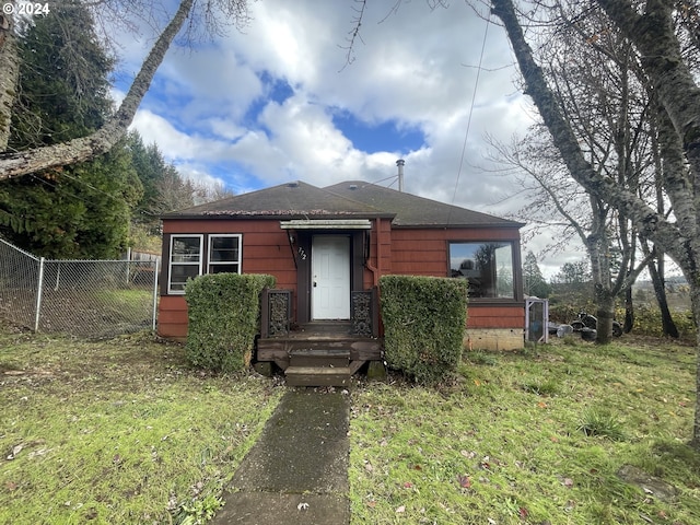 bungalow with a front yard