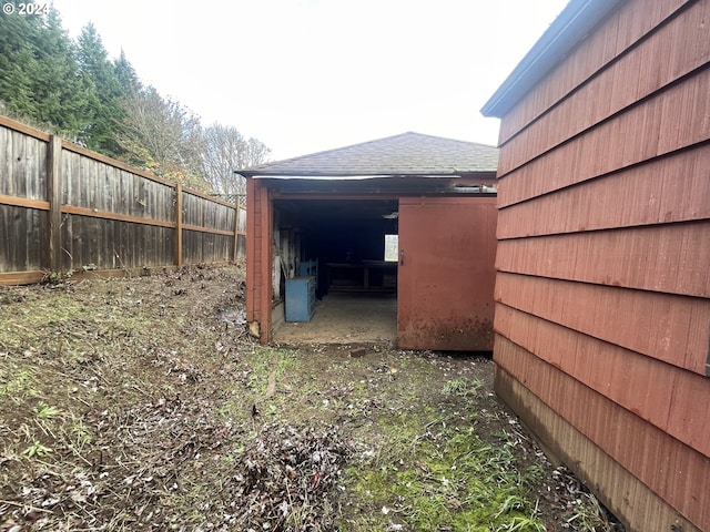 view of home's exterior featuring an outdoor structure