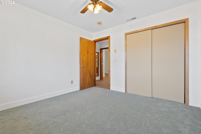 42 Fellers Rd, Carson, WA 98610 - unfurnished bedroom with ceiling fan, a closet, visible vents, carpet flooring, and baseboards