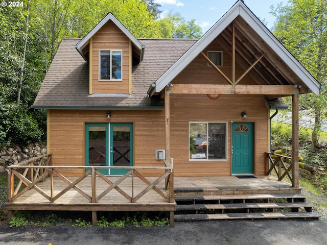 exterior space featuring a wooden deck