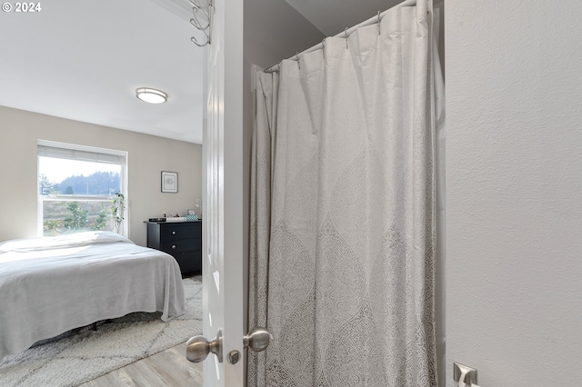 bedroom featuring hardwood / wood-style floors