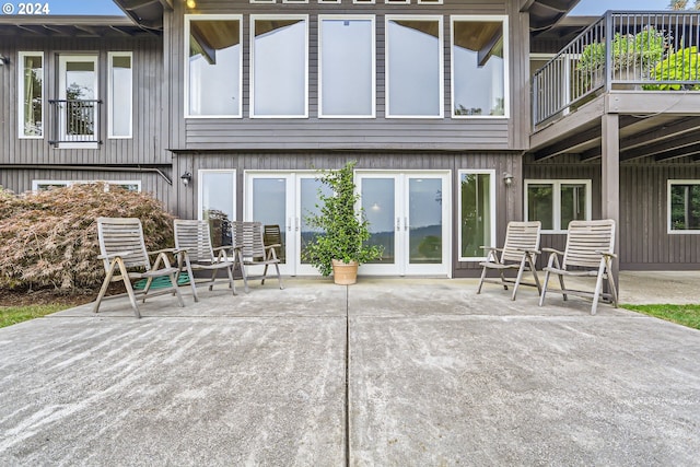 back of house featuring a patio area and french doors