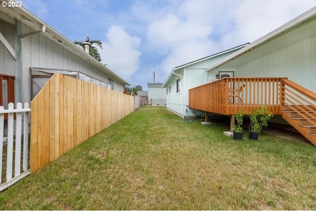 view of yard featuring a deck