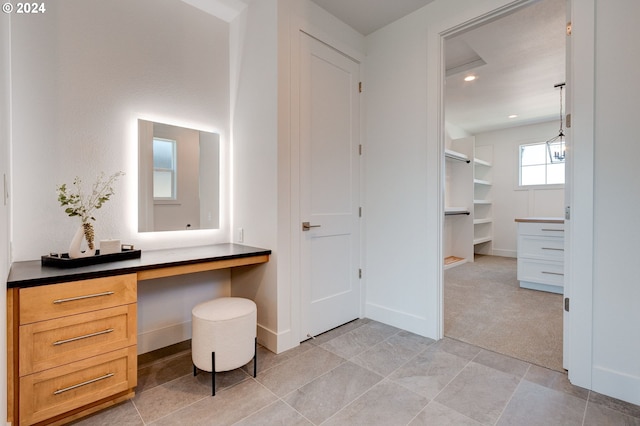 bathroom featuring tile patterned floors, recessed lighting, and baseboards