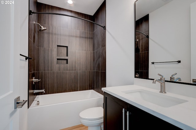 full bathroom featuring toilet, vanity, and shower / bath combination