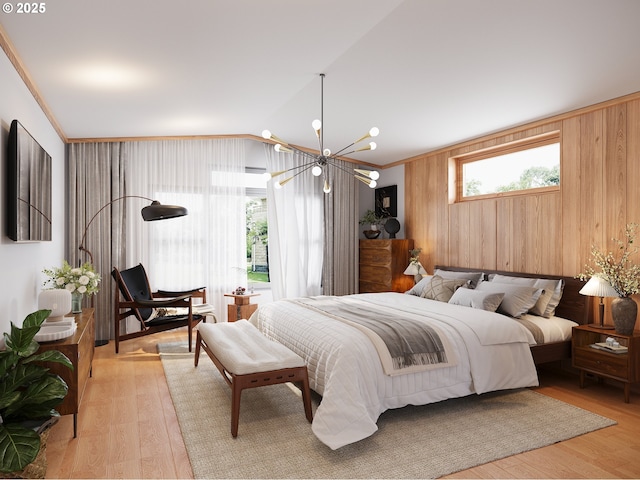 bedroom with an inviting chandelier, wood walls, ornamental molding, and light wood-type flooring