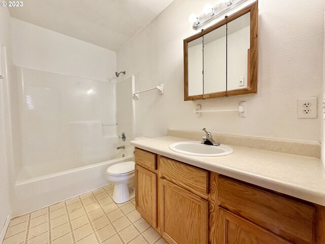 full bathroom featuring shower / bath combination, tile floors, toilet, and oversized vanity