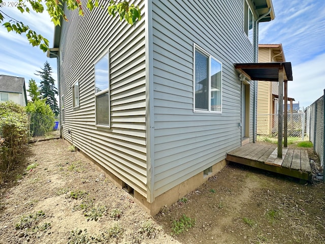 view of property exterior featuring a deck