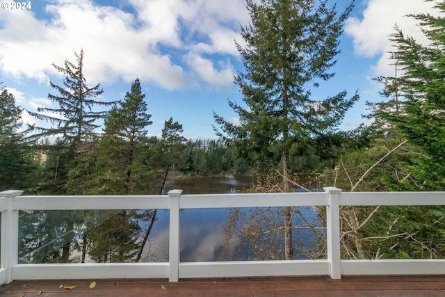 88378 Collard Lake Rd, Florence, OR 97439 - wooden deck featuring a water view and a view of trees