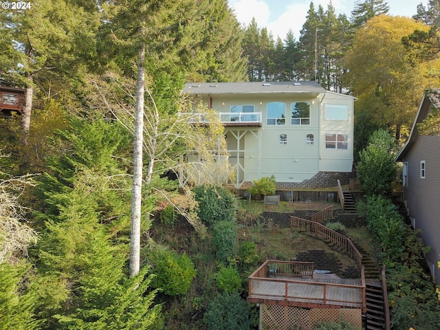 88378 Collard Lake Rd, Florence, OR 97439 - back of house with stairs and a deck