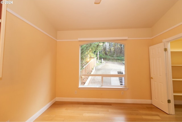 unfurnished room with light hardwood / wood-style floors