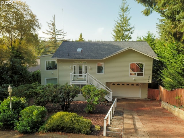 view of front of property with a garage