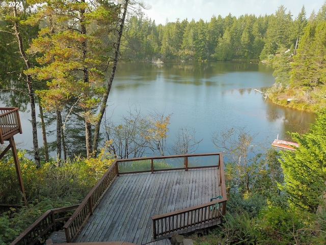 deck featuring a water view