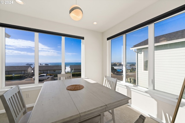 dining area featuring baseboards, carpet flooring, and recessed lighting