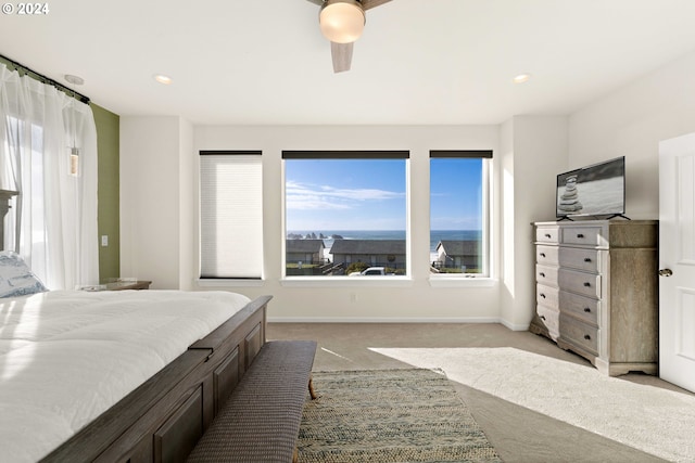 bedroom with baseboards, light carpet, a ceiling fan, and recessed lighting
