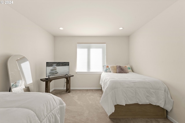 bedroom with recessed lighting, baseboards, and light carpet