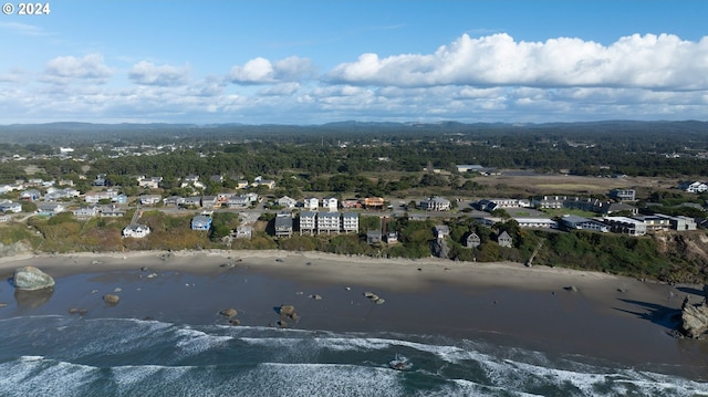 bird's eye view with a beach view and a water view