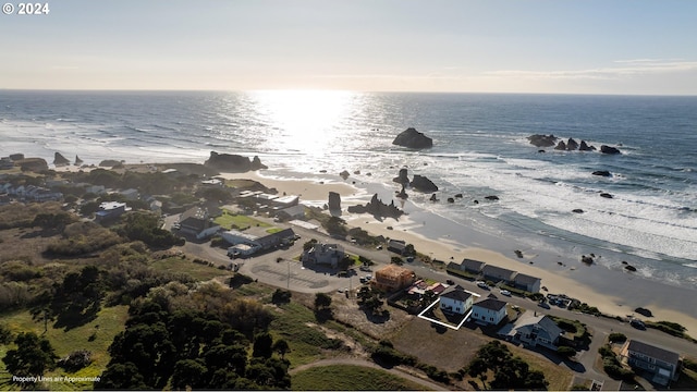 aerial view with a beach view and a water view