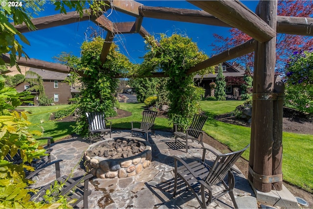 view of patio with a fire pit