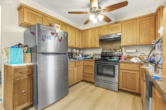 kitchen with ceiling fan, decorative backsplash, light stone countertops, light hardwood / wood-style floors, and stainless steel appliances