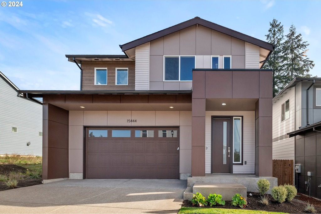 view of front of home with a garage