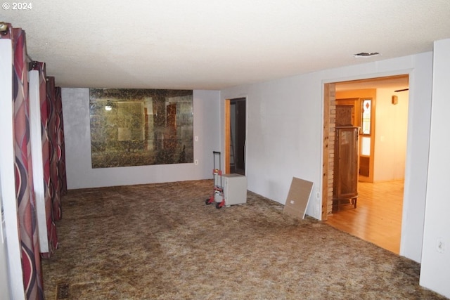 empty room featuring hardwood / wood-style flooring