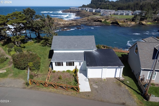 drone / aerial view with a water view