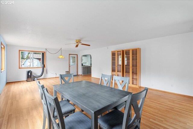 dining area featuring ceiling fan and light hardwood / wood-style floors