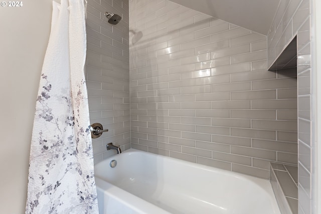 bathroom featuring shower / bath combination with curtain