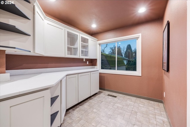 kitchen with white cabinetry