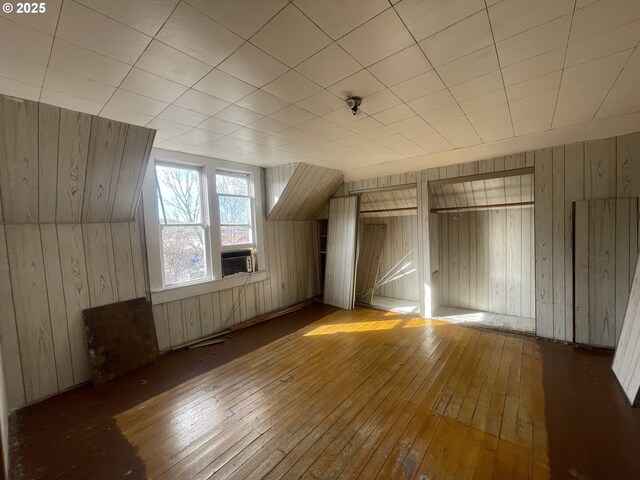 bathroom with toilet, vaulted ceiling, and vanity