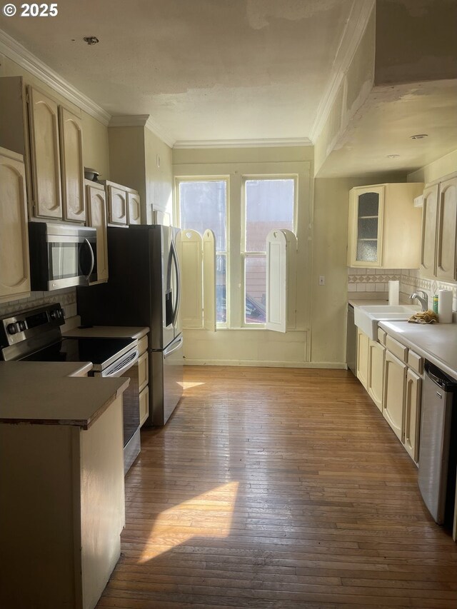 bedroom featuring crown molding, wood-type flooring, and a notable chandelier