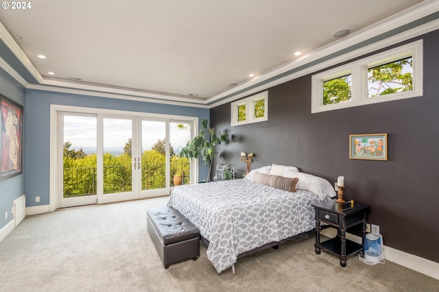 bedroom featuring light carpet, ornamental molding, and access to exterior