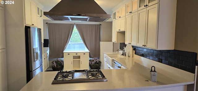 kitchen with decorative backsplash, white cabinetry, gas cooktop, extractor fan, and stainless steel fridge with ice dispenser