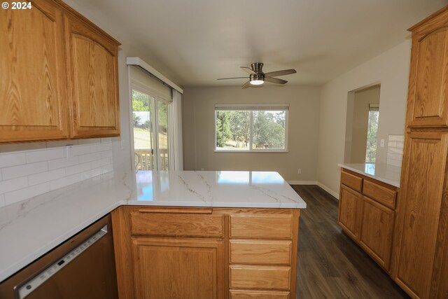 kitchen with dishwasher, decorative backsplash, dark hardwood / wood-style floors, kitchen peninsula, and ceiling fan