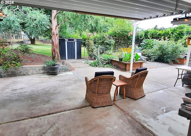 view of patio with a storage shed