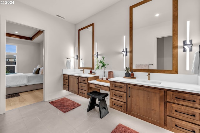 bathroom featuring hardwood / wood-style floors and vanity