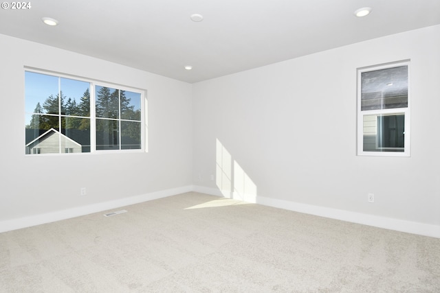 view of carpeted spare room