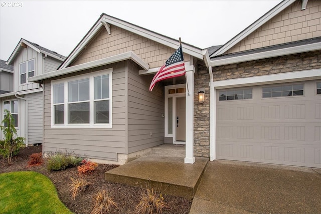 view of front of property with a garage