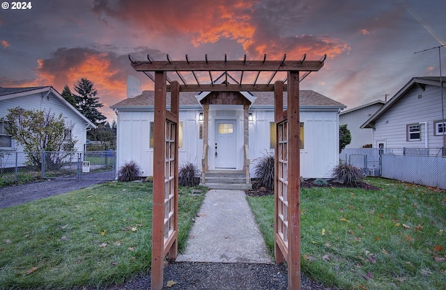 view of front of home featuring a yard