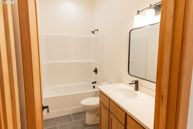 full bathroom with toilet, vanity, shower / bath combination, and tile patterned floors