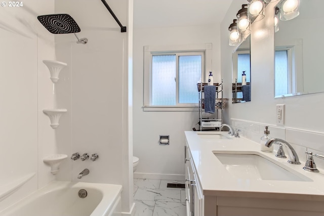 full bathroom featuring vanity, washtub / shower combination, and toilet