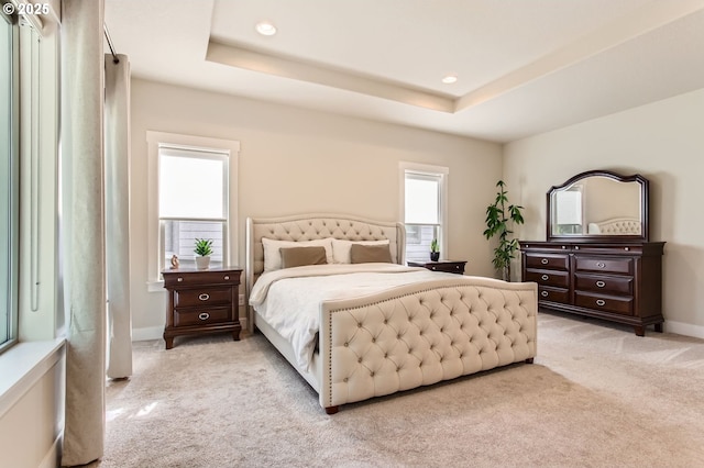 13632 SW 174th Loop, Sherwood, OR 97140 - bedroom with light carpet, baseboards, a tray ceiling, and recessed lighting