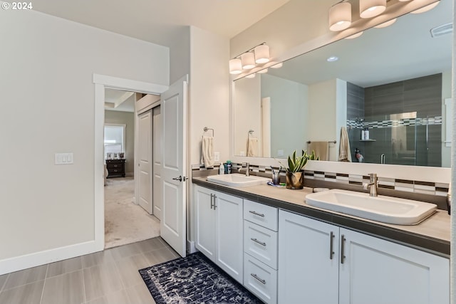 13632 SW 174th Loop, Sherwood, OR 97140 - full bathroom with double vanity and a stall shower
