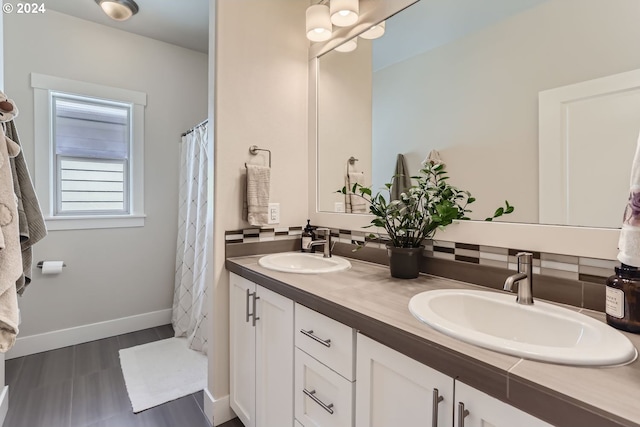 13632 SW 174th Loop, Sherwood, OR 97140 - bathroom with double vanity and baseboards