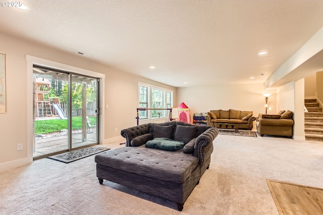 13632 SW 174th Loop, Sherwood, OR 97140 - carpeted living area featuring stairway, recessed lighting, and baseboards