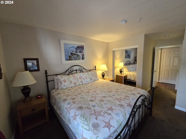 carpeted bedroom featuring a closet