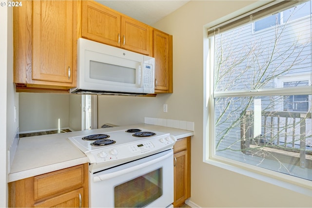 kitchen featuring white appliances